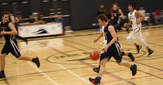 Another win for senior boys basketball image